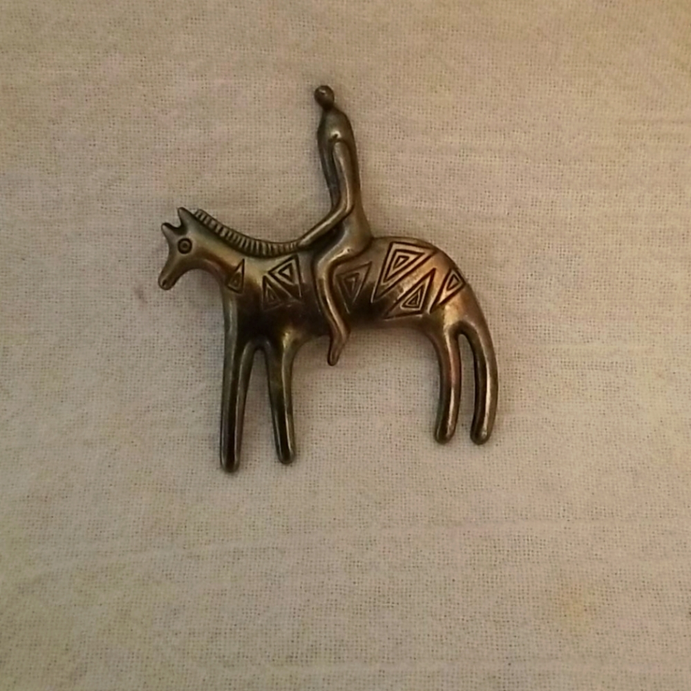 Man on horse pin